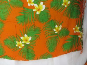 orange sarong yellow plumier flower green leaf