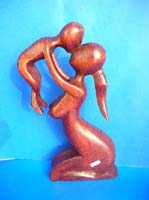 Mother playing with kids statue