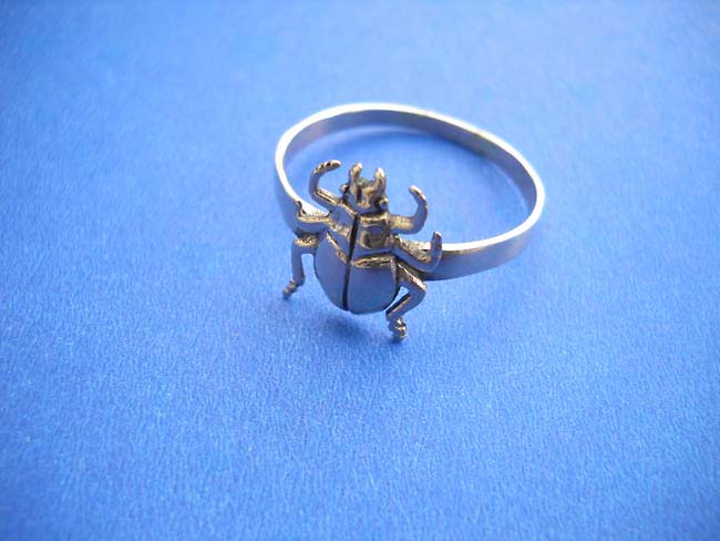 Bronze ring with lady bug design