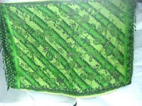 Indonesian traditional sarong in green classical designs