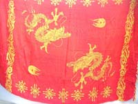 organge red sarong wrapped skirts with Chinese dragons play with flaming pearls 