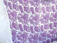 sarong with purple butterfly and leaves on white background 