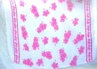 beach clothing sarongs with pink hibiscus flowers on white background
