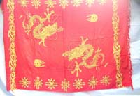 red sarong wrapped skirts with Chinese dragons play with flaming pearls