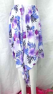 Unique resort apparel skirt or top with stretchy elastic band, uneven hemline and tropical motif pattern