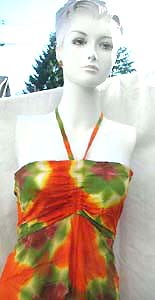fashion beach wear dress in tropical theme pattern with unique, uneven, hemline and slimming top