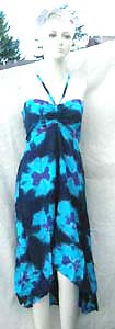 fashion beach wear dress in tropical theme pattern with unique, uneven, hemline and slimming top