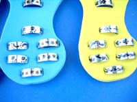 Assortment of black etch-in pattern adjustable silver plated toe ring