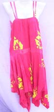 Sexy beach wear dress in tropical theme pattern with unique, uneven, hemline and slimming top