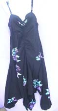 Sexy beach wear dress in tropical theme pattern with unique, uneven, hemline and slimming top