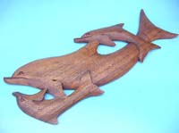 A dolphin family plaque