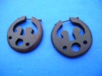 Artist carved circle shape wood earring with cut out hole design