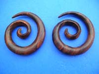Spiral wooden ear plug stretchers