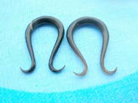 organic ear expanders in U shape with wavy