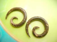 traditional spiral plugs in coconut wood