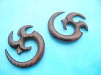 wooden flesh plugs and ear stretchers