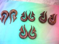 Heavy gauge wood taper expander ear plug