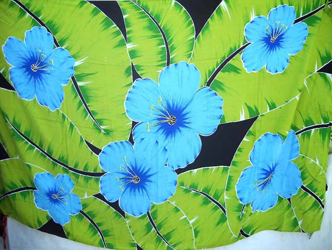 Enlarge lime leafs with sky blue 5 petals flower on black sarong