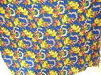 Yellow and green garden print design on blue fashion wrap