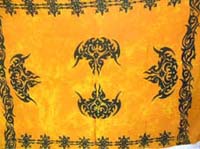 Tribal tattoo art crest on orange and black casual wear sarong