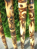 Bali bali didgeridoo with fire burning design on bamboo