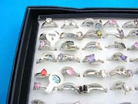 Silver designer inspired ring with fun flirty cz gem