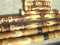 Handcrafted instrument rain stick with art designs