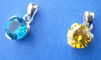Round elegant cut yellow or turquoise cubic zirconia sterling silver pendant