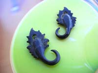 Asian elephant theme artwear earrings, made from organic horn