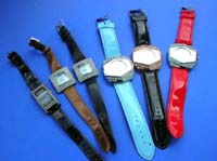 Unique gem embedded clock frame on beautiful faux leather wrist band of watch 