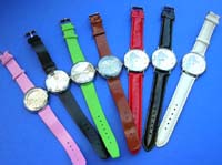Fun theme clock face design on ladies watch, with colored imitation leather band 