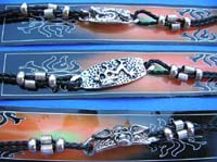 Alternative fashion leather bracelet with silver ID tag and silver beads 