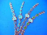 Elegant ladies watch with enamel design in link chain wrist band