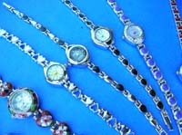 Ladies evening wear fashion watch with enamel design in chain link bracelet 