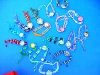 Fun beaded bracelet on summer watch with clear gems inlaid in clock face