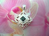 Fashionable Stamped 925. sterling silver pendant in trendy diamond shape pattern with a black cz gem