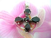 Spring flower theme sterling silver necklace charm with 5 red garnet stones