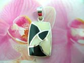 Trendy 925. sterling silver pendant with golden line pattern and white mother of pearl and black onyx stone