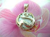 Bali art design in 925. sterling silver pendant with white mother of pearl seashell at center