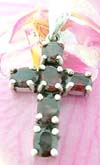 Christian cross pendant made of sterling silver and 6 rounded red garnet stones