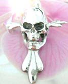 New age skull pendant with fleur de lie cross behind, made from sterling silver 