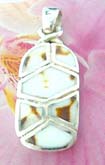 Sterling silver pendant in oval shape design with 6 white seashell pieces 