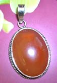 Costume period piece pendant with sterling silver frame and gemstone center