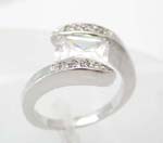 Wholesale cheaper body jewelry, C shape pattern with a clear cz square, cz ring