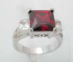 a large red cz squre with 2 mini clear cz square and 2 linear pattern on each side