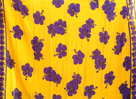 Purple floral pattern with small flower decor each side and a string on each side


