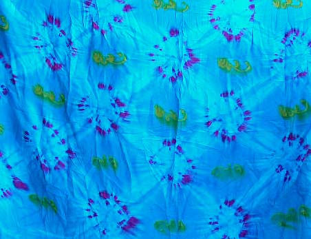 Wholesale woman apparel, tye dye blue long skirt with floral pattern decor