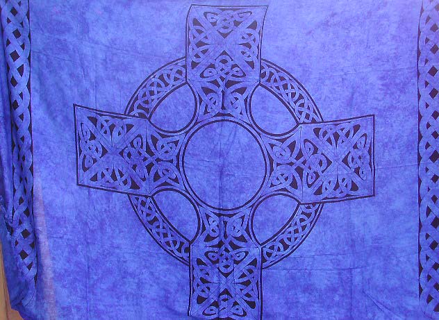 Celtic fashion trend, blue sarong with Celtic knot around Celtic cross center