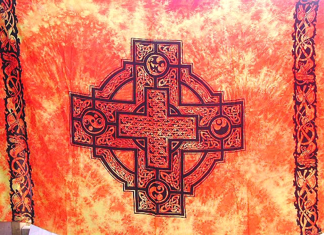 Orange Batik rayon sarong with Celtic cross pattern at center and Celtic knot work patteWholesale Celtic dress-faded orange sarong with Celtic knot work around Celtic cross center