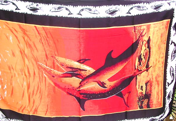 Four dolphin playing in the red and orange deep sea          